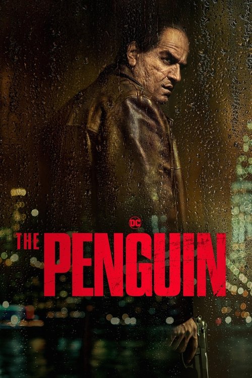 The poster features a man in a dark, wet coat against a moody, rainy night backdrop. The title "THE PENGUIN" is prominently displayed in bold red letters, evoking mystery and suspense. The overall atmosphere is dark and atmospheric, suggesting a thriller or crime drama.