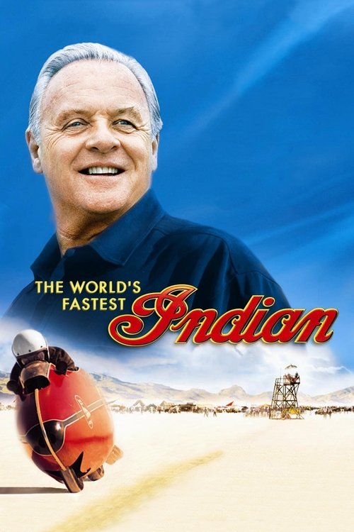 The poster features a smiling Indian man in a blue shirt against a vibrant blue sky, with the title "The World's Fastest Indian" prominently displayed in red and gold. A red helmet and a golden trophy are visible in the foreground, suggesting an adventurous and competitive theme. The overall mood...