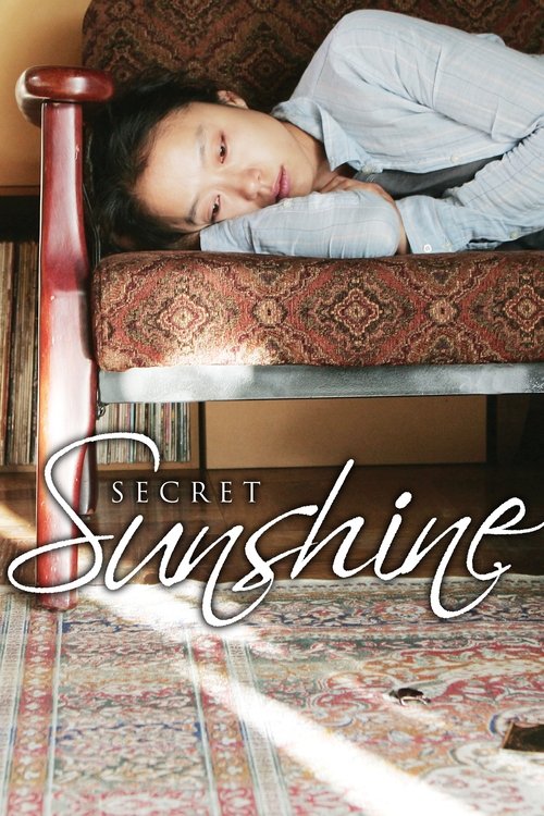 The poster features a young girl sleeping peacefully on a patterned sofa, bathed in warm sunlight that creates a dreamy, nostalgic atmosphere. The title "Secret Sunshine" is elegantly displayed in white script, evoking a sense of hidden beauty and gentle magic.
