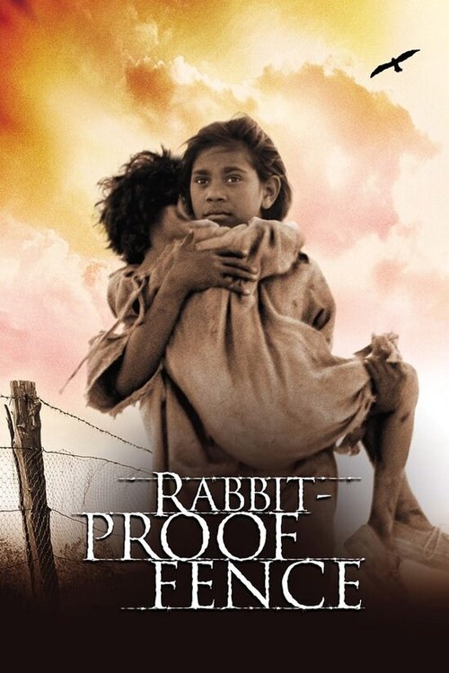 The poster features a woman in a flowing coat, her expression conveying deep emotion, against a dramatic sunset sky. A bird flies in the upper right corner, adding to the sense of freedom and movement. The title "Rabbit-Proof Fence" is prominently displayed in bold, rustic lettering, evoking a se...
