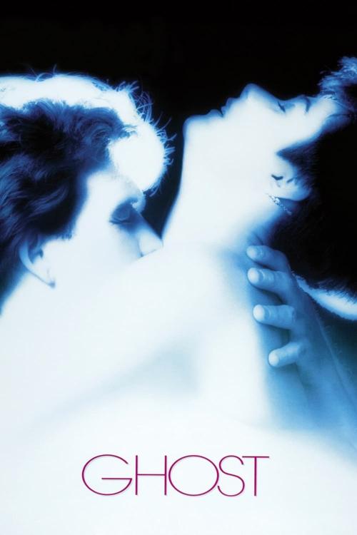 The poster features two figures in a close embrace, their faces illuminated by a soft, ethereal blue light against a dark background. The mood is mysterious and intimate, suggesting a supernatural or thriller genre. The title "GHOST" is prominently displayed at the bottom in bold, pink letters.