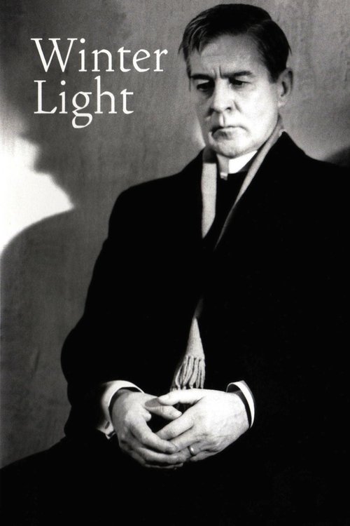 The poster features a somber portrait of a man in a dark suit against a muted background, evoking a melancholic mood. The title "Winter Light" is elegantly placed in white text, suggesting a film about hope amidst darkness.