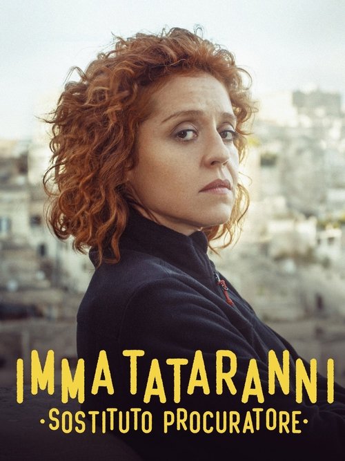 The poster features a woman with curly red hair, wearing a dark jacket, looking intently to the side. The background shows a blurred cityscape, suggesting an urban setting. The text "IMMA TATARANNI" is prominently displayed in bold yellow letters at the bottom, with "SOSTITUTO PROCURATORE" writte...