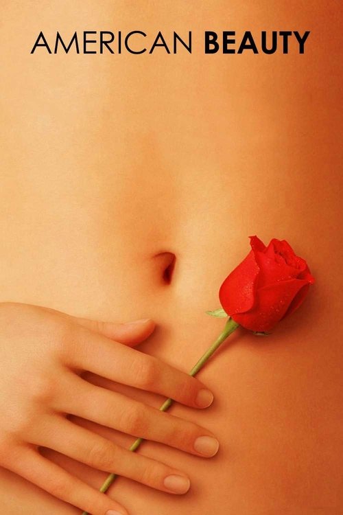 The poster features a close-up of a woman's bare chest, with her hand gently holding a single red rose. The warm, golden lighting enhances the intimate and romantic mood, while the bold, serif typography "AMERICAN BEAUTY" anchors the composition.