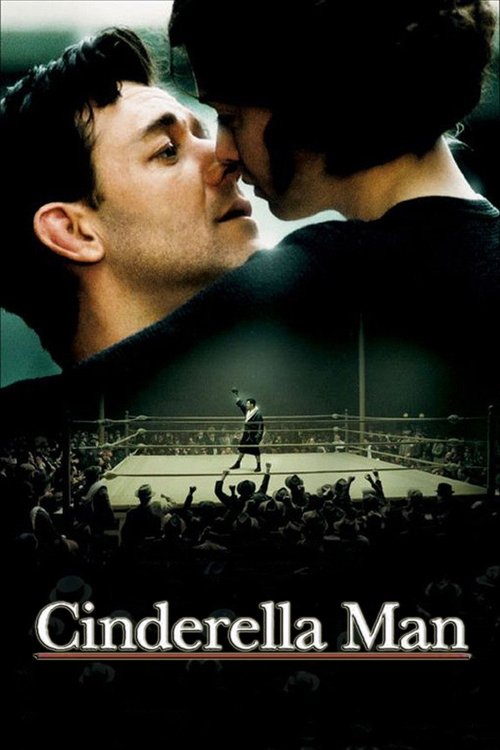 The poster features a dramatic close-up of two men in an intimate embrace, with one looking up at the other. The background shows a dimly lit stage with a performer, evoking a mysterious and romantic atmosphere. The title "Cinderella Man" is prominently displayed at the bottom in elegant script.