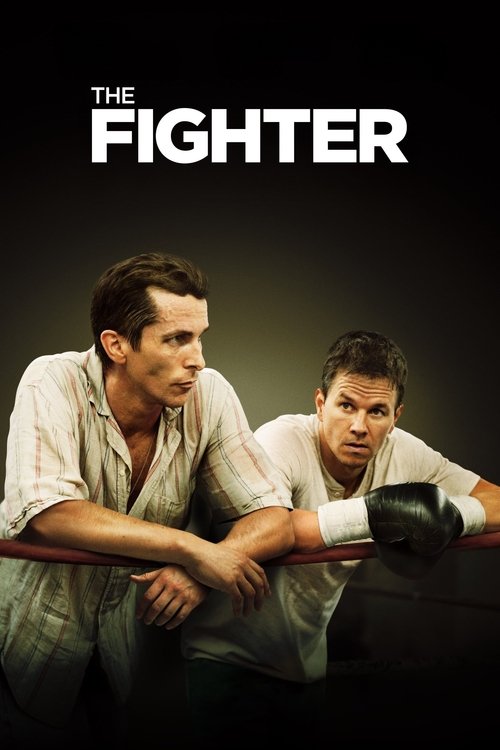 The poster features two men in boxing attire against a dark background, exuding intensity and focus. The bold white title "THE FIGHTER" dominates the top, while the men's serious expressions and dynamic poses convey the gritty, high-stakes atmosphere of the film.