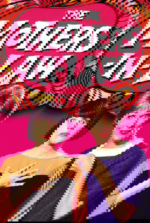 The poster features two women with retro hairstyles and expressive poses against a vibrant pink background. The title "The Mothers-in-Law" is prominently displayed in bold white letters with a playful, swirling design. The overall mood is cheerful and nostalgic, capturing the essence of mid-centu...