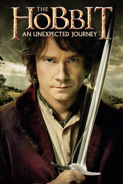 The poster features a determined young man holding a sword, set against a dramatic sky with distant mountains. The rich red and brown tones evoke a sense of adventure and fantasy. The title "The Hobbit" is prominently displayed in bold, golden lettering, emphasizing the epic nature of the story.