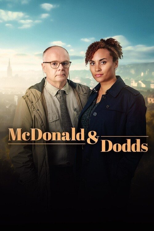 The poster features two characters, a bald man in a suit and a woman with short hair, standing against a cityscape backdrop. The warm lighting and golden tones evoke a sense of mystery and intrigue, hinting at the show's blend of comedy and drama.