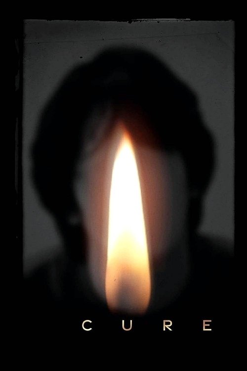 The poster features a dark silhouette of a person with a glowing, flickering candle in the center, creating an eerie and mysterious atmosphere. The word "CURE" is subtly placed at the bottom, hinting at the film's supernatural horror genre.