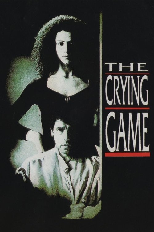The poster features two women in a moody, sepia-toned scene against a dark background. The title "The Crying Game" is prominently displayed in bold, red and white lettering. The overall atmosphere is eerie and suspenseful, suggesting a thriller or horror genre.