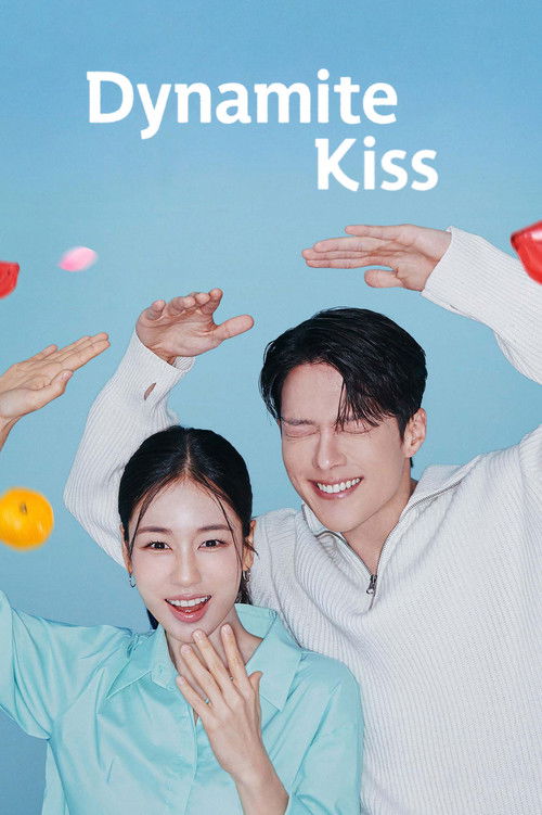 The poster features a cheerful couple in a light blue background, with the title "Dynamite Kiss" prominently displayed. Their joyful expressions and playful poses convey a lighthearted and romantic mood, suggesting a sweet and fun relationship.