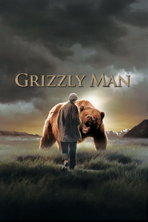 The poster features a lone figure walking through a grassy field, with a roaring grizzly bear looming behind him. The dark, moody sky and earthy tones create a tense, mysterious atmosphere, hinting at the film's suspenseful and dramatic tone.